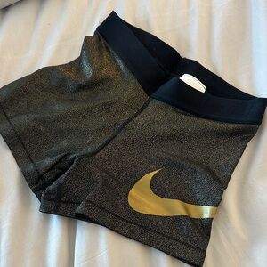 Nike Pro Women's Athletic Shorts in Black and Gold
